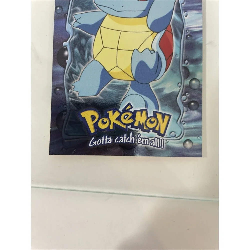 SQUIRTLE E7 TOPPS Smooth Holofoil The First Movie Pokémon Card